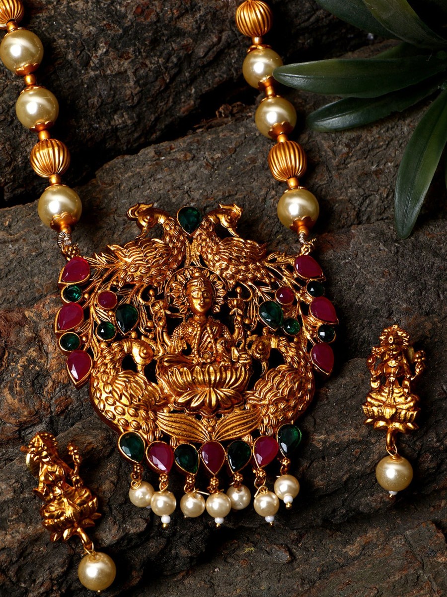 Jewellery Anikas Creation | Antique Matte Gold Finish Goddess Laxmi Green Stone Studded Temple Jewellery Set - Anikas Creation Multicolor