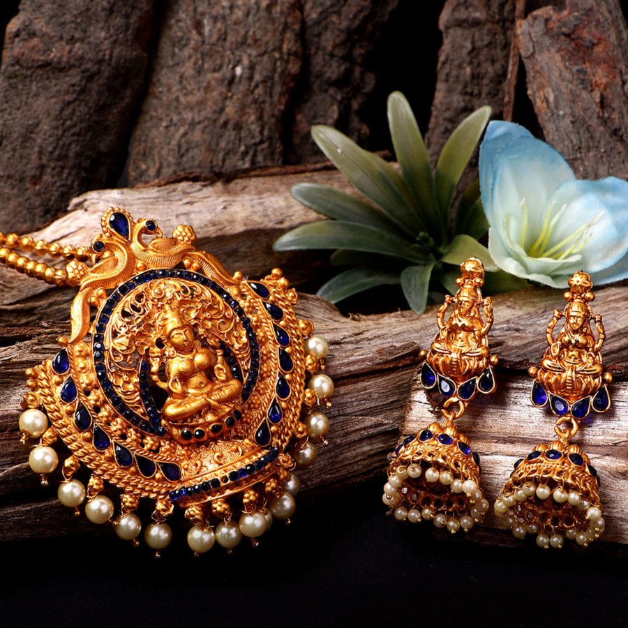 Jewellery Anikas Creation | Antique Matte Gold Finish Goddess Laxmi Blue Stone Studded Temple Jewellery Set - Anikas Creation Multicolor